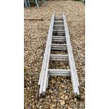 A 3 SECTION 8 RUNG ALUMINIUM LADDER.