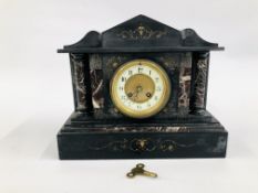 A VINTAGE SLATE AND MARBLE MANTEL CLOCK WITH COLUMN DETAIL.