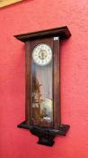 A VINTAGE RECTANGULAR WALL CLOCK WITH ENAMELLED STRIKING DIAL - H 100CM.