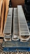 SEVEN CONCRETE 1 METRE DRAINAGE GULLEYS WITH STEEL GRATE TOPS.