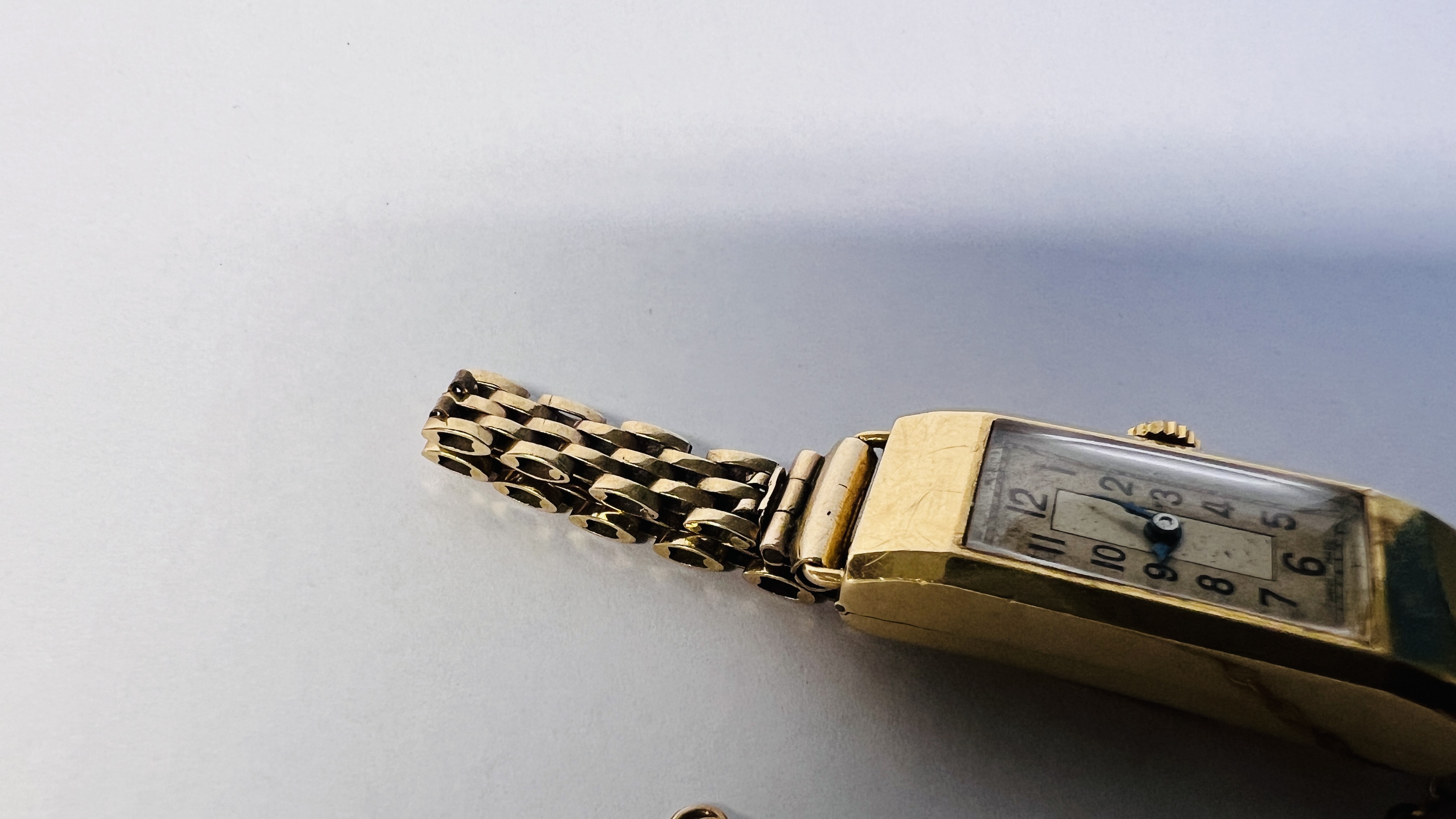 A LADIES 18CT GOLD CASED COCKTAIL WATCH WITH SWISS MOVEMENT ON 9CT GOLD BRACELET. - Image 12 of 44
