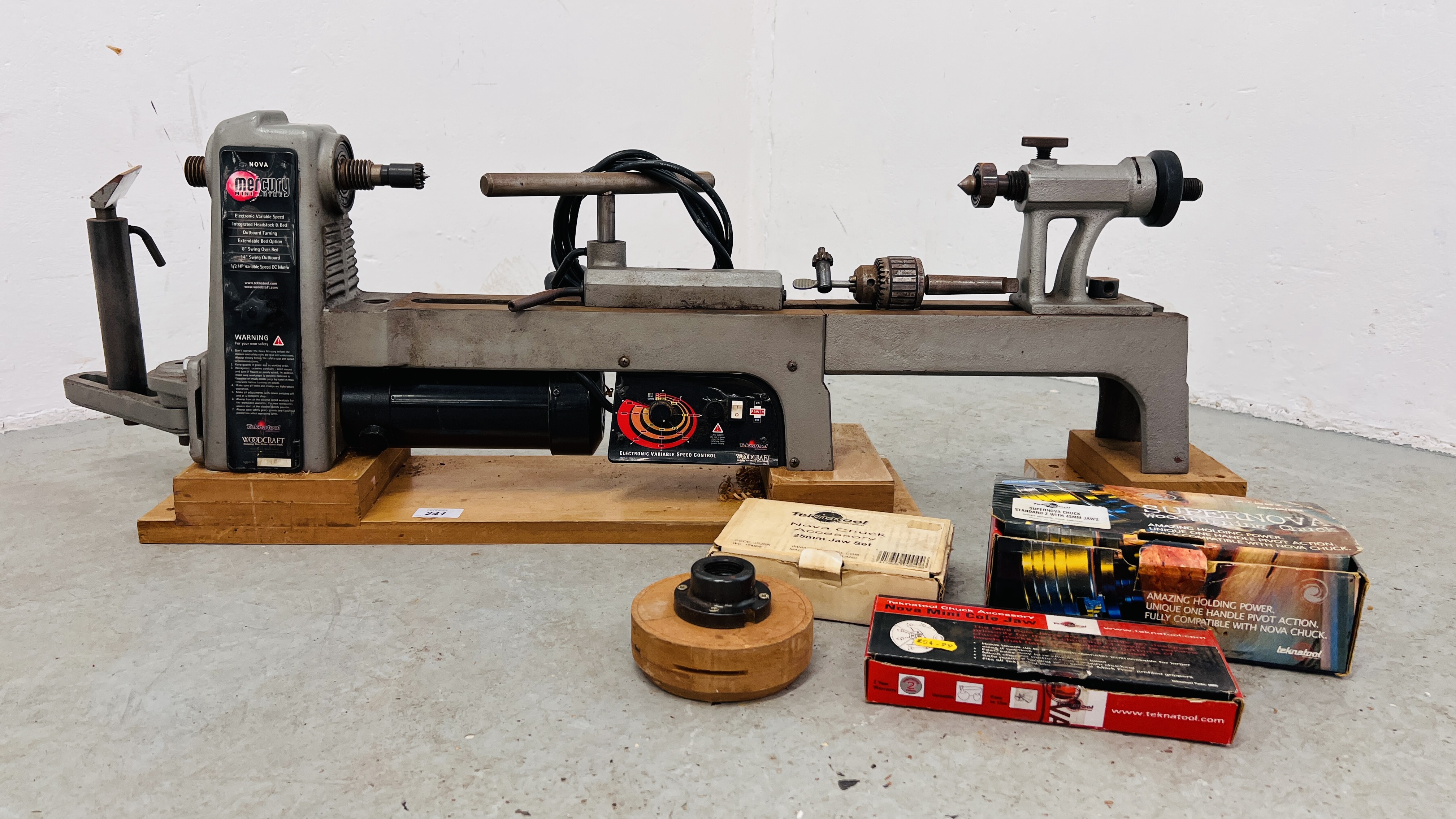 A NOVA MERCURY MINI LATHE WITH ELECTRONIC VARIABLE SPEED CONTROL WITH ACCESSORIES - SOLD AS SEEN.