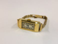 A LADIES 18CT GOLD CASED COCKTAIL WATCH WITH SWISS MOVEMENT ON 9CT GOLD BRACELET.