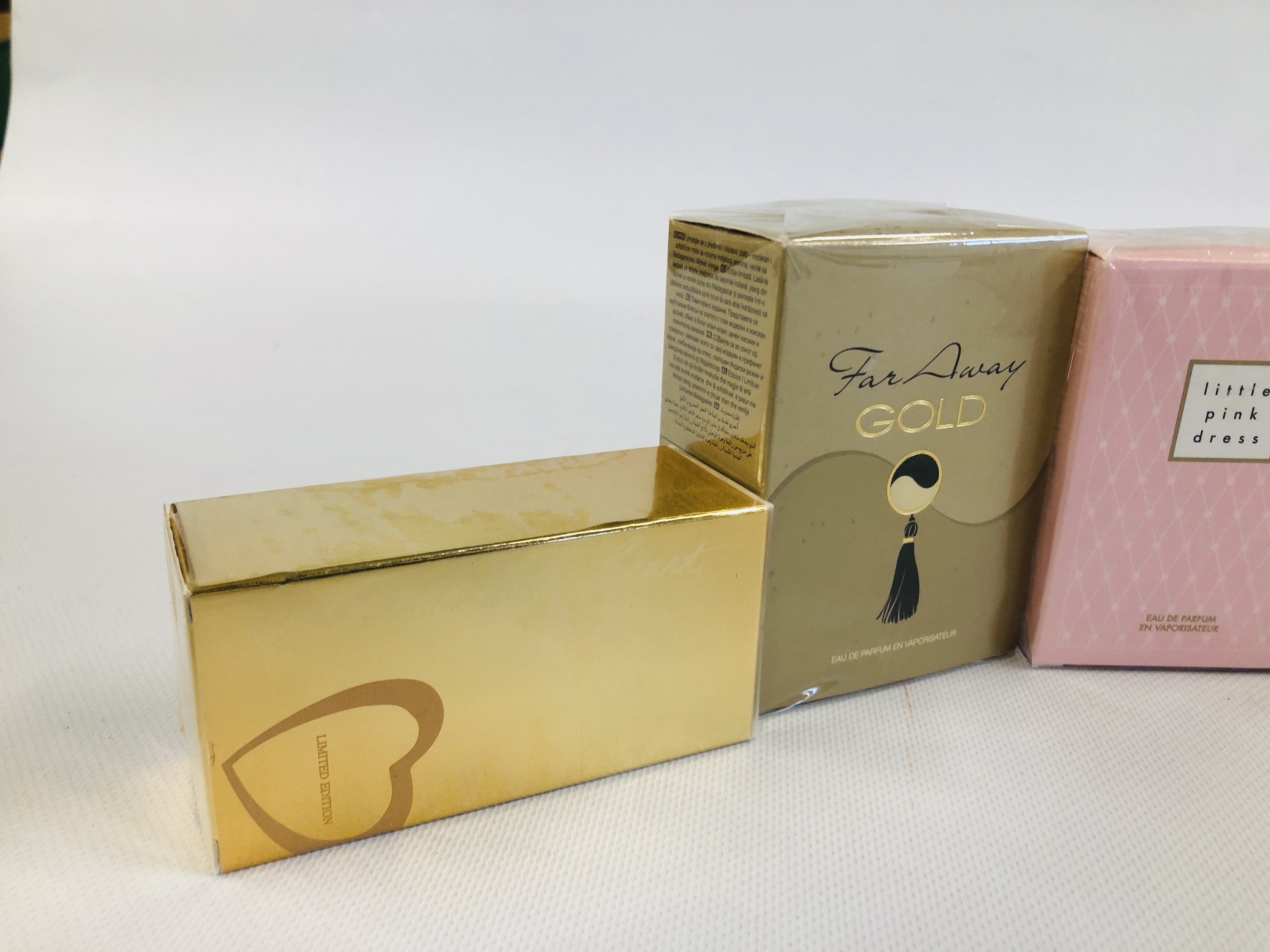 A GROUP OF 9 AVON PARFUMS TO INCLUDE LITTLE PINK DRESS, FAR AWAY, SENSUEILE, - Image 2 of 4