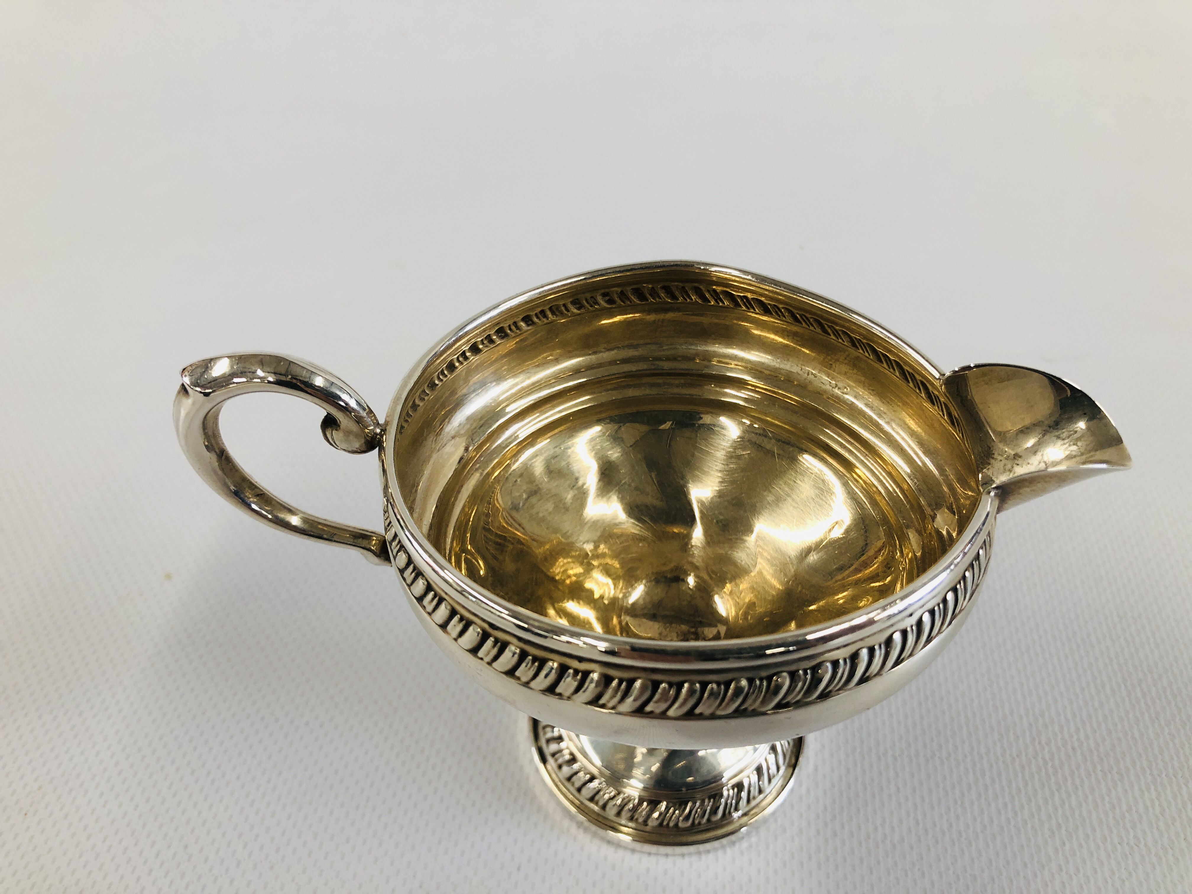 A DECORATIVE CREAM JUG AND MATCHING TWO HANDLED SUGAR BOWL MARKED "CROWN" STERLING. - Image 11 of 13