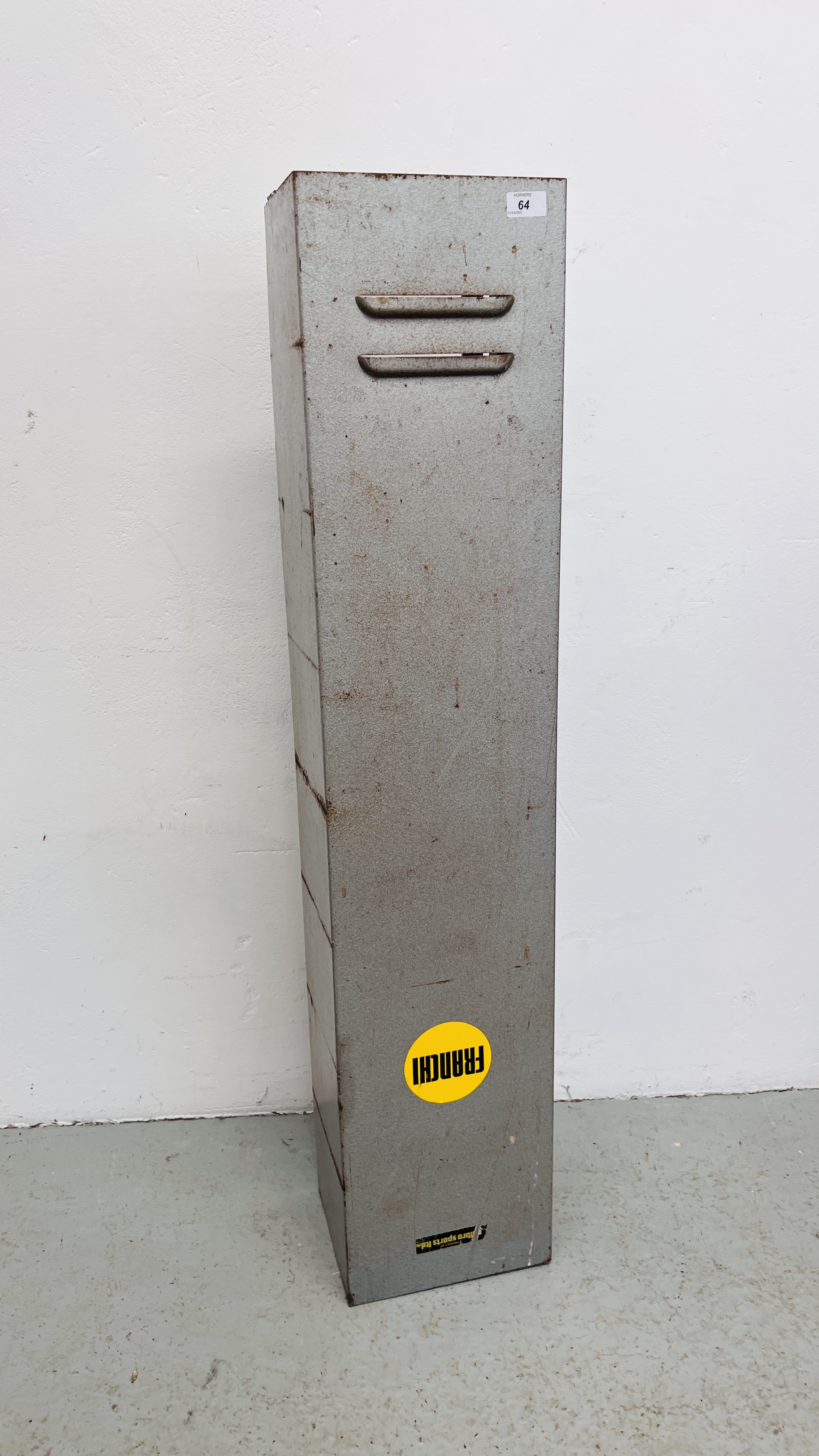 A STEEL WALL MOUNTED SECURITY CABINET COMPLETE WITH KEY.