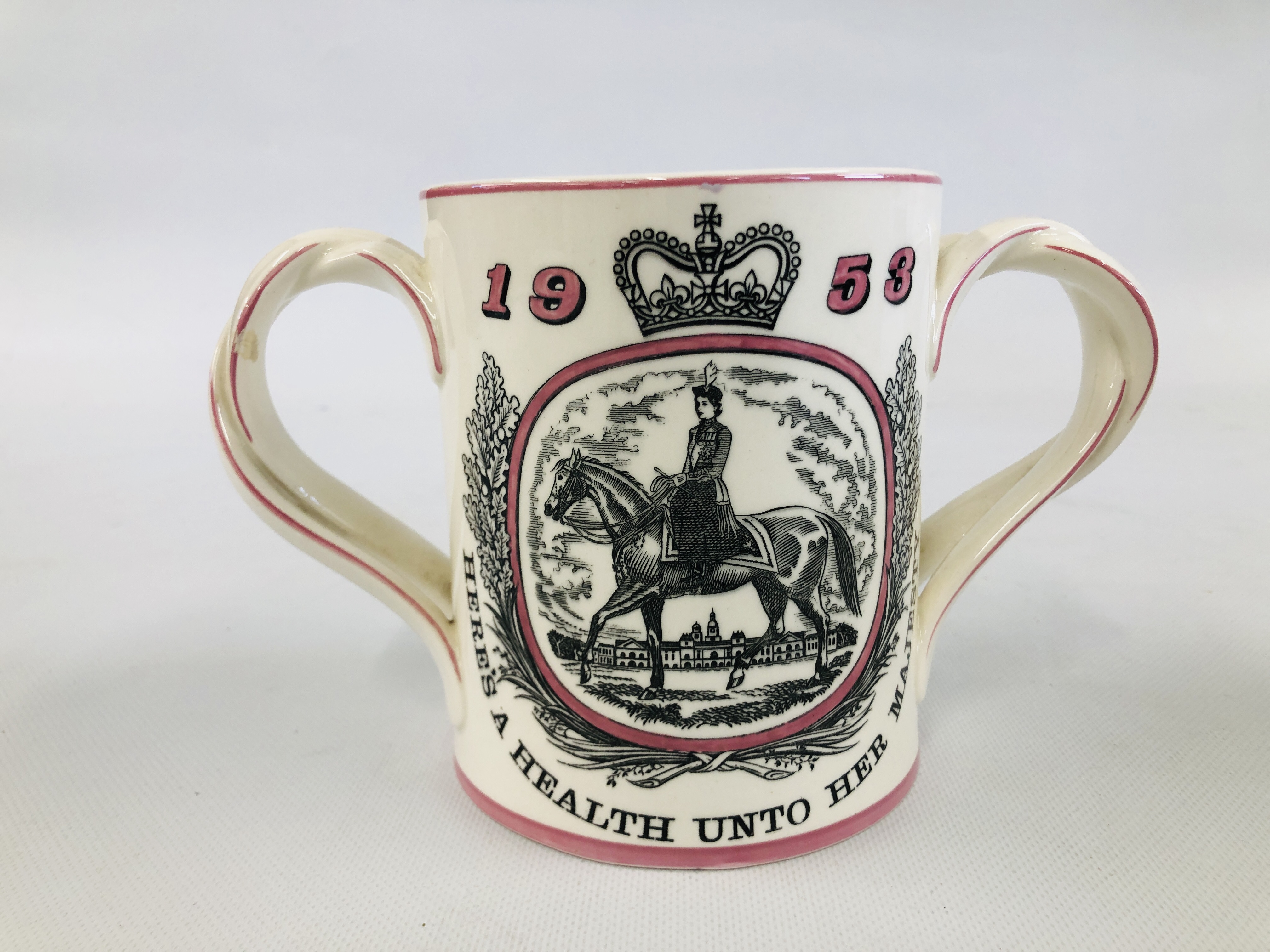 A VINTAGE ROYAL DOULTON TWO HANDLED MUG "MADE FOR COURAGE AND COMPANY LIMITED LONDON" DESIGNED BY