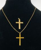 A VINTAGE CROSS & CHAIN MARKED 9CT ALONG WITH A FURTHER 9CT GOLD CROSS.