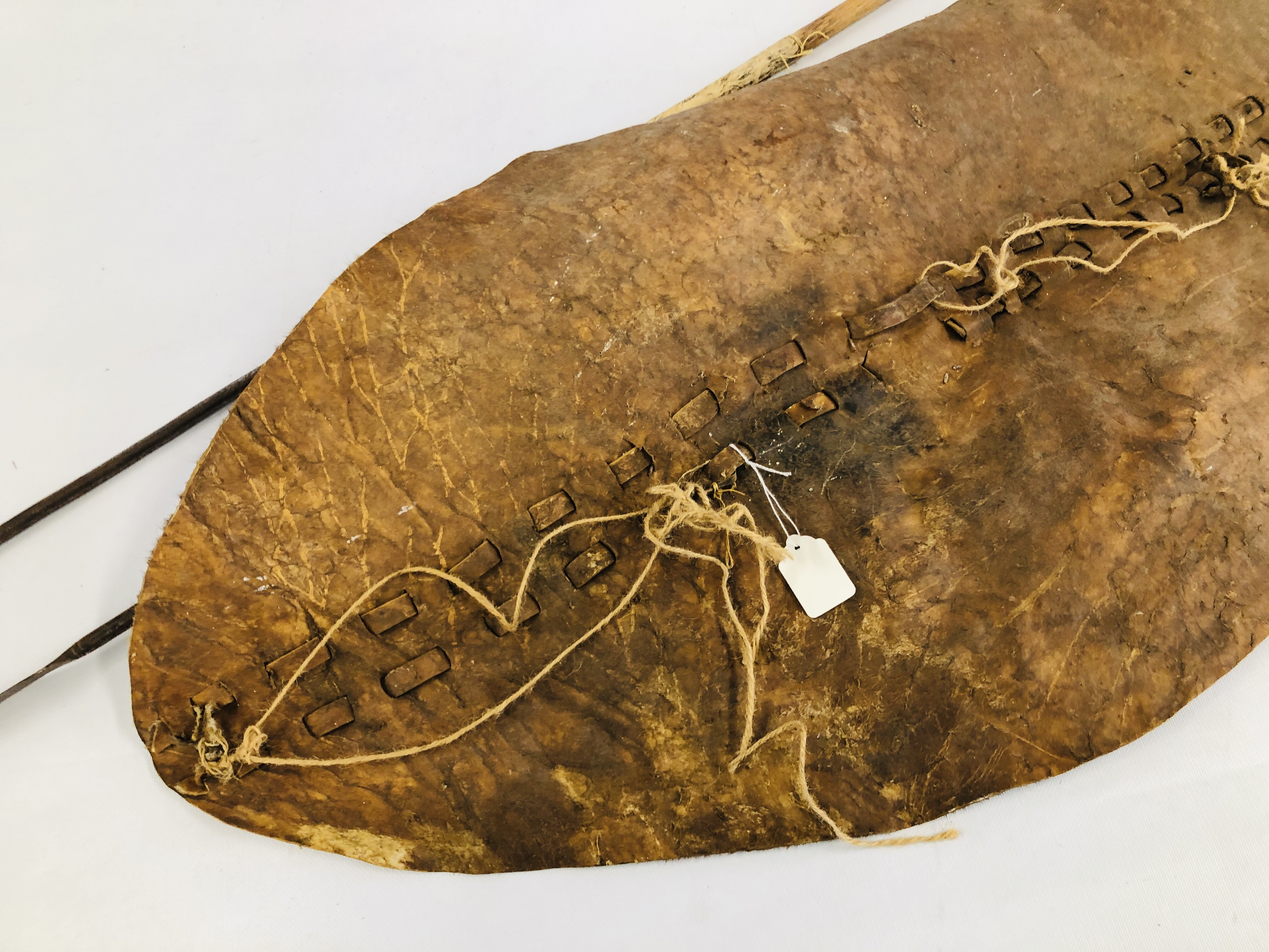 C19th LEATHER ZULU SHIELD ALONG WITH TWO THROWING SPEARS - THE SHIELD MEASURING 104 X 51CM ALONG - Image 14 of 15