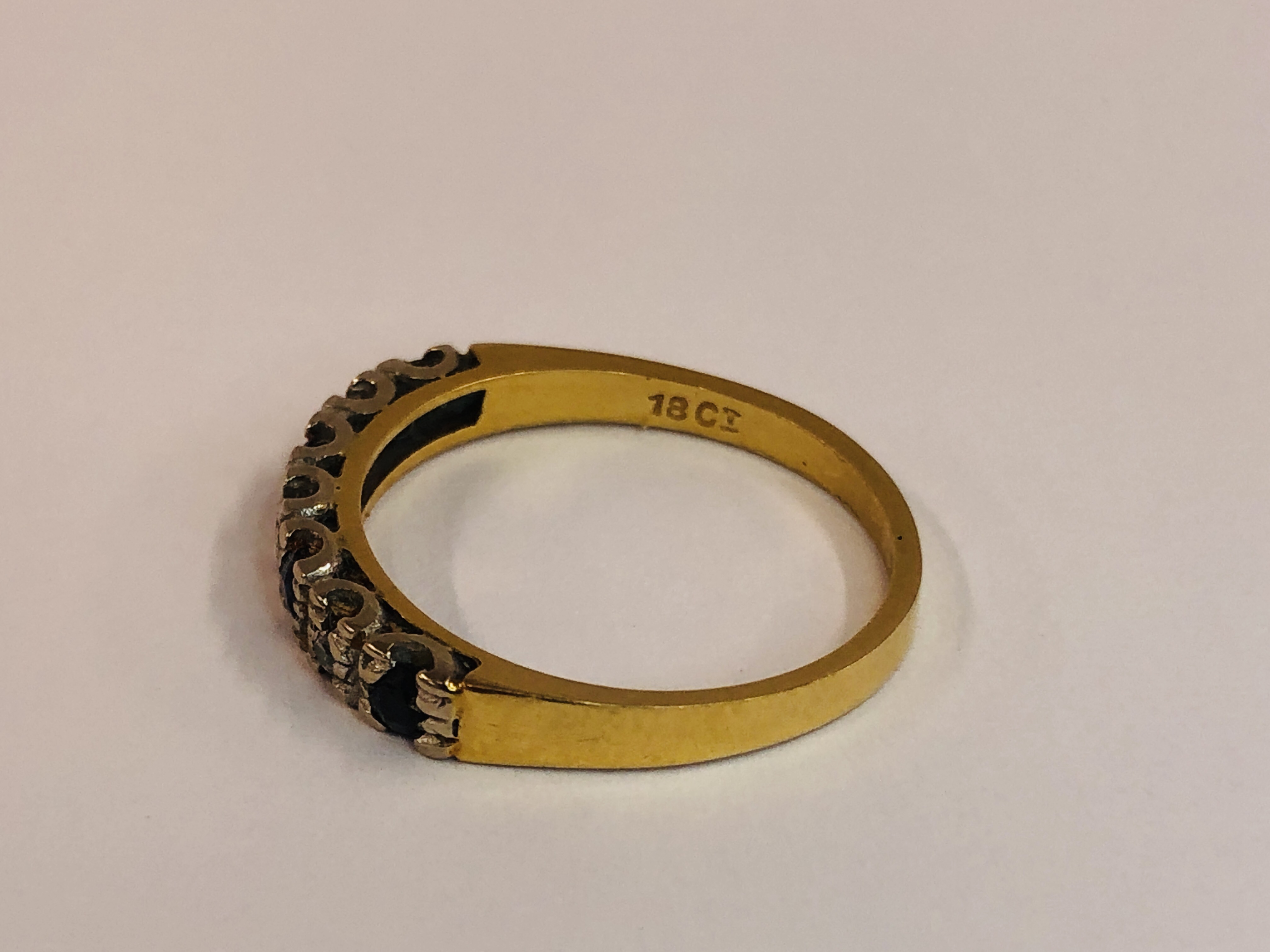 AN 18CT GOLD SAPPHIRE & DIAMOND HALF ETERNITY RING. - Image 5 of 8