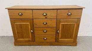 PINE MULTI DRAWER SIDEBOARD.