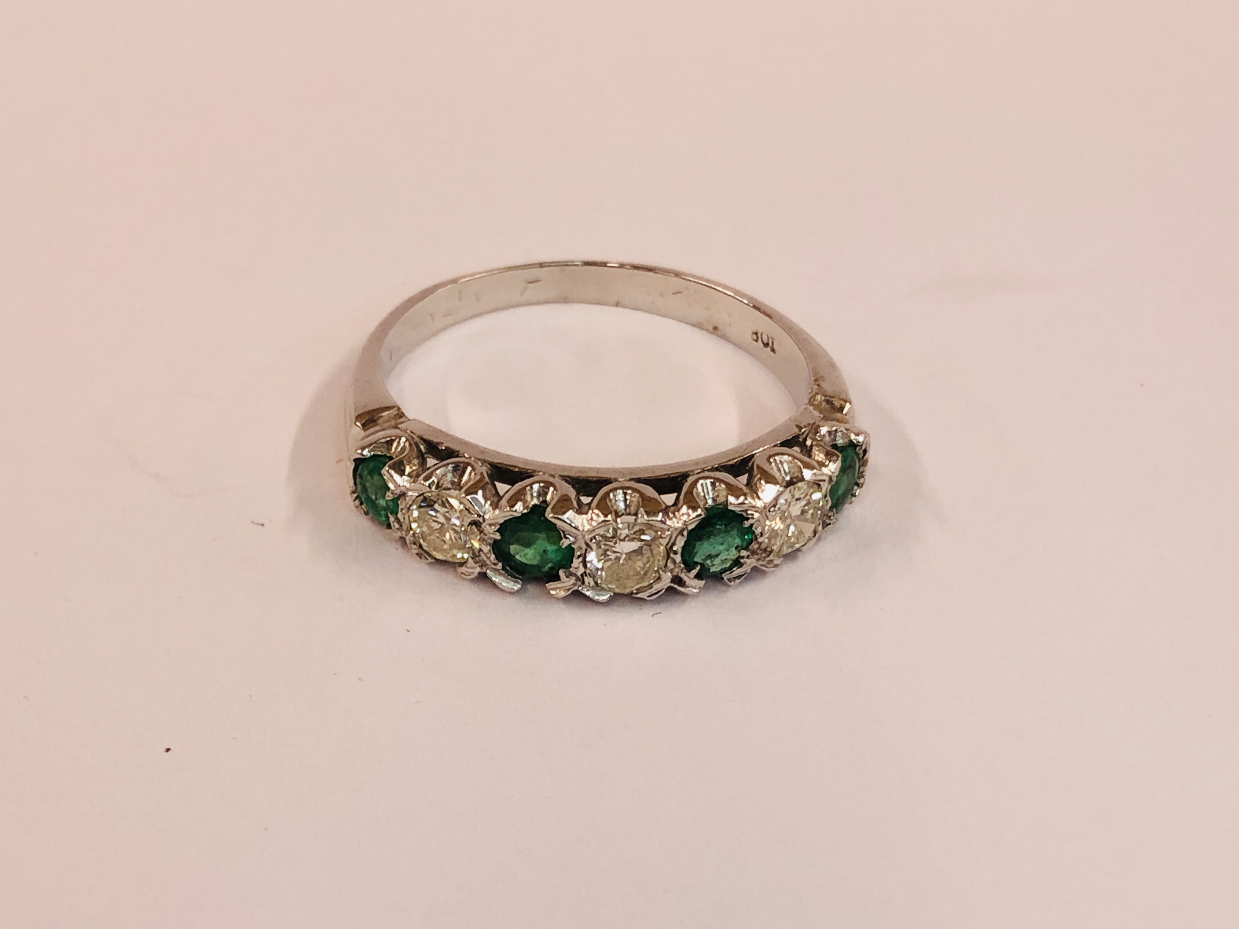 AN 18CT WHITE GOLD EMERALD AND DIAMOND HALF HOOP ETERNITY RING. - Image 2 of 7