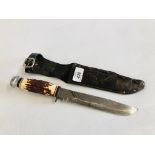 A SCHUR "ORIGINAL BOWIE KNIFE" COMPLETE WITH LEATHER BELT HOLSTER (18 YEARS OF AGE AND OVER) - NO