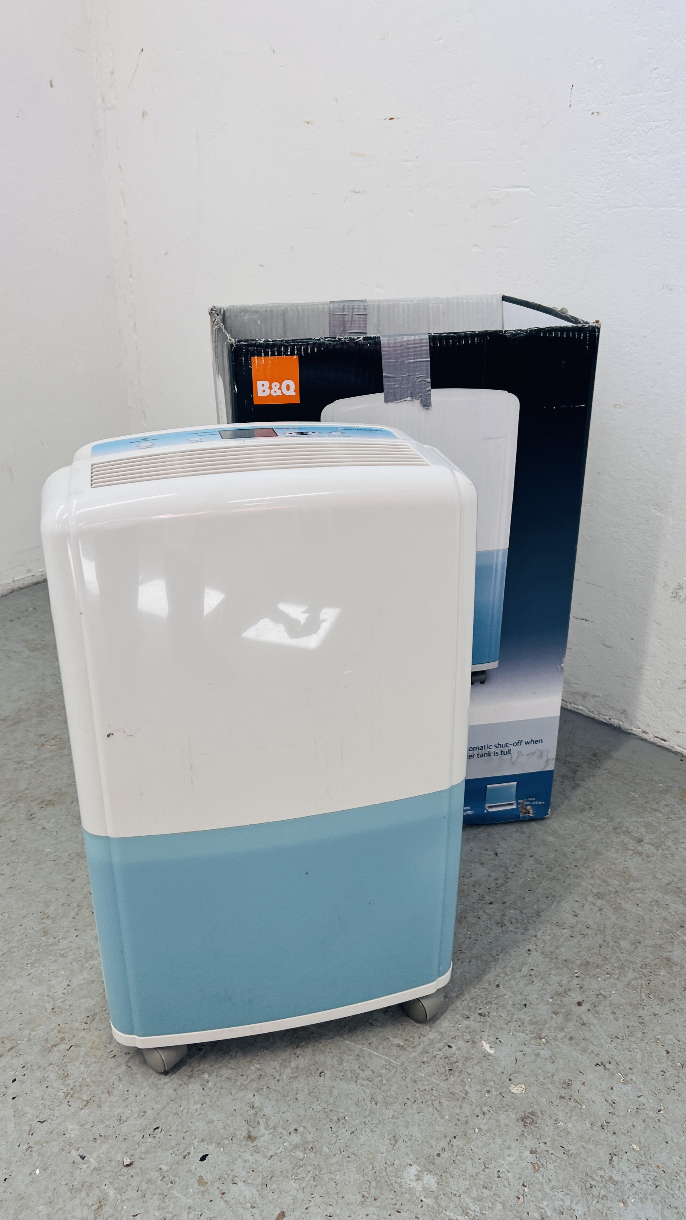 A 16L DEHUMIDIFIER ALONG WITH ORIGINAL BOX - SOLD AS SEEN.