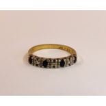 AN 18CT GOLD SAPPHIRE & DIAMOND HALF ETERNITY RING.