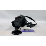 A CANON EOS 550D DSLR CAMERA BODY FITTED WITH ADDITIONAL BATTERY GRIP,
