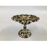 A CONTINENTAL WHITE METAL PEDESTAL SWEETMEAT DISH OF GADROONED FORM,