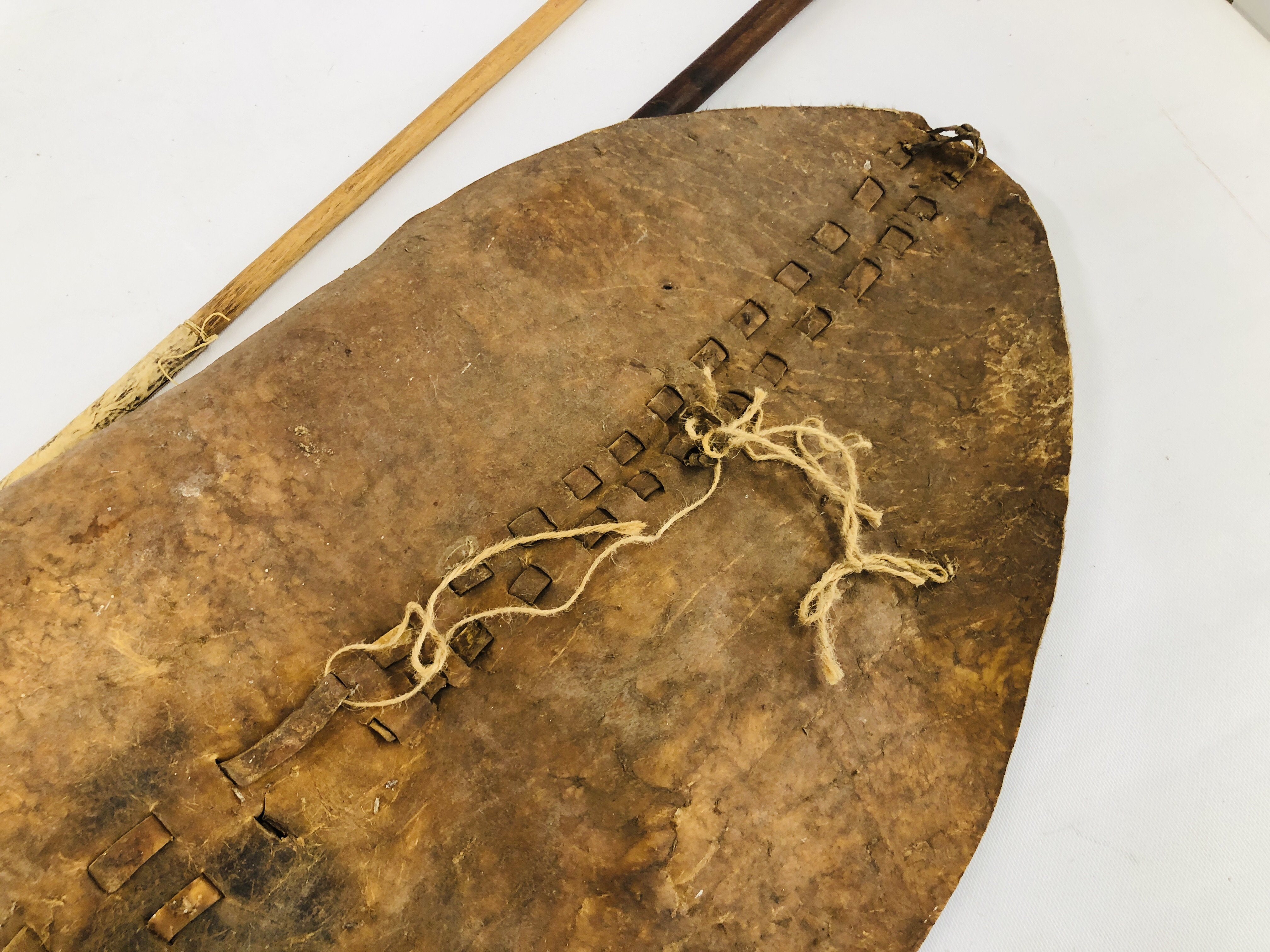 C19th LEATHER ZULU SHIELD ALONG WITH TWO THROWING SPEARS - THE SHIELD MEASURING 104 X 51CM ALONG - Image 15 of 15