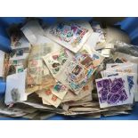 LARGE TUB ALL WORLD STAMPS IN PACKETS AND LOOSE.