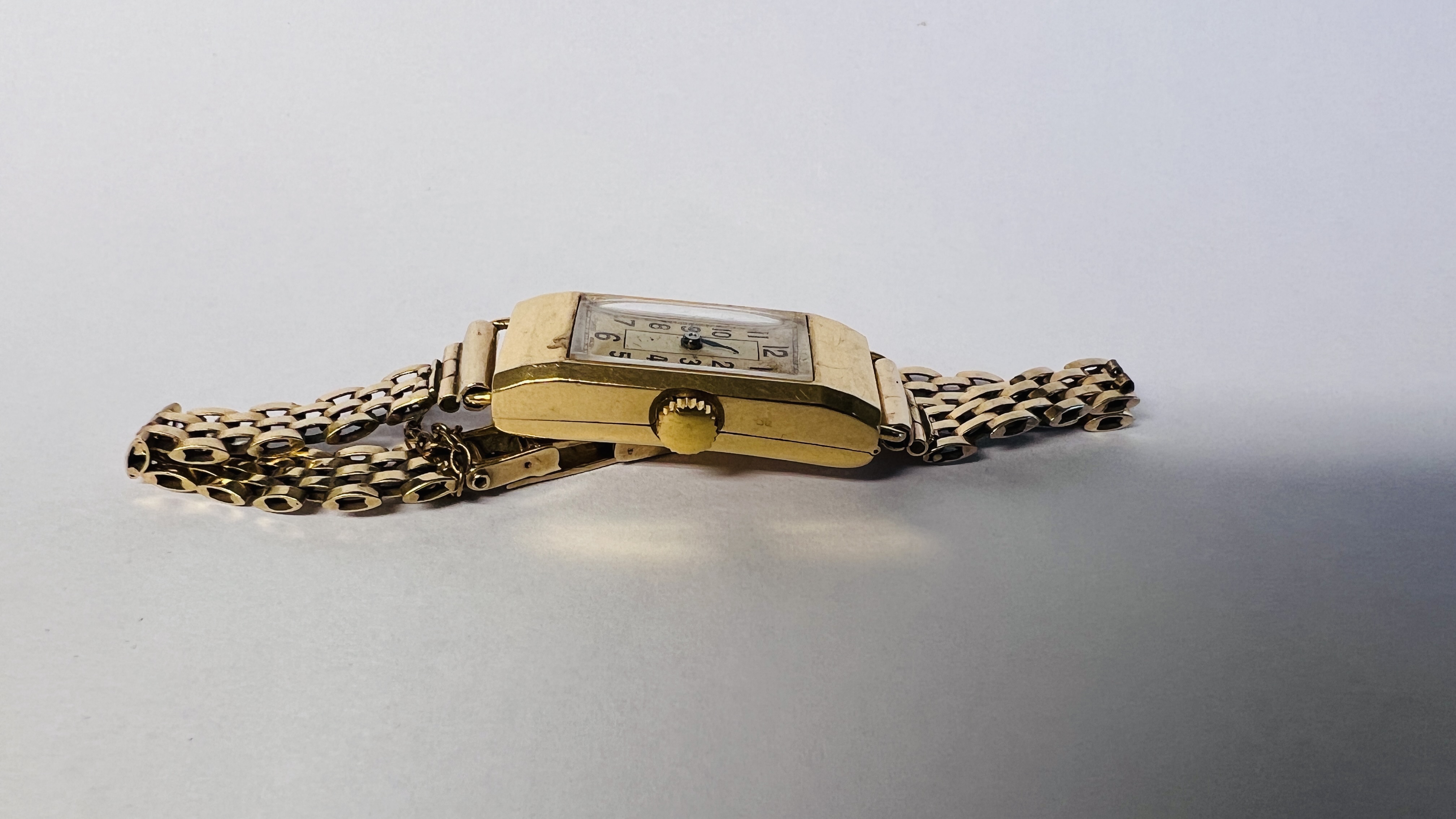 A LADIES 18CT GOLD CASED COCKTAIL WATCH WITH SWISS MOVEMENT ON 9CT GOLD BRACELET. - Image 9 of 44