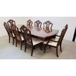 A REPRODUCTION MAHOGANY TWIN PILLAR DINING TABLE WITH THREE EXTRA LEAVES,