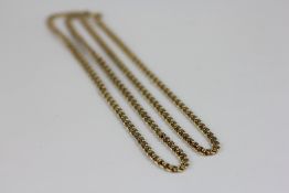 A GOLD WOVEN LINK CHAIN MARKED 375 APPROXIMATELY 60CM.