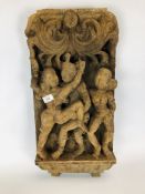 A VINTAGE HAND CARVED WOODEN WALL PLAQUE OF EROTIC FIGURES.