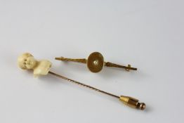 AN ANTIQUE TIE PIN,