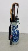 A MODERN CHINESE BLUE AND WHITE VASE, NOW USED AS A STICKSTAND,