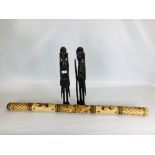 A PAIR OF HARDWOOD CARVED AFRICAN FIGURES AND WOODEN DIDGERIDOO.