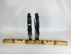 A PAIR OF HARDWOOD CARVED AFRICAN FIGURES AND WOODEN DIDGERIDOO.