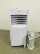 SWISS OVA PORTABLE AIR CONDITIONER ALONG WITH REMOTE AND MANUAL - SOLD AS SEEN.