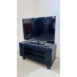 A SONY 40" FLATSCREEN TELEVISION SET WITH STAND, MODEL KDL-40W4500 - SOLD AS SEEN.
