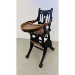 A VINTAGE CHILD'S HIGH CHAIR WITH MECHANICAL ACTION.