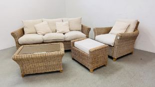 A MODERN CANE CONSERVATORY SUITE COMPRISING OF A THREE SEATER SOFA, AN ARMCHAIR,