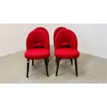 A SET OF FOUR RED UPHOLSTERED DINING CHAIRS.