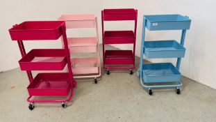 FOUR MODERN METAL THREE TIER WHEELED BASKET UNITS.