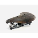 A VINTAGE LEATHER BROOK BICYCLE SADDLE.