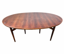 A VINTAGE MID CENTURY ROSEWOOD FINISH MANUFACTURED BY SIBAST FURNITURE DENMARK EXTENDING DINING