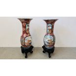 A PAIR OF LARGE AND IMPRESSIVE ANTIQUE JAPANESE VASES ON HARDWOOD CARVED STANDS,