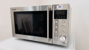 A SHARP STAINLESS STEEL MICROWAVE - SOLD AS SEEN.