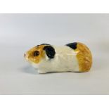 A WINSTANLY MODEL OF A GUINEA PIG, HEIGHT 6CM X LENGTH 18CM.