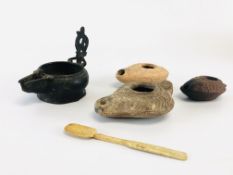 A GROUP OF FOUR ARTIFACTS TO INCLUDE 3 TERRACOTTA OIL LAMPS AND A BRONZE EXAMPLE ALONG WITH A BONE