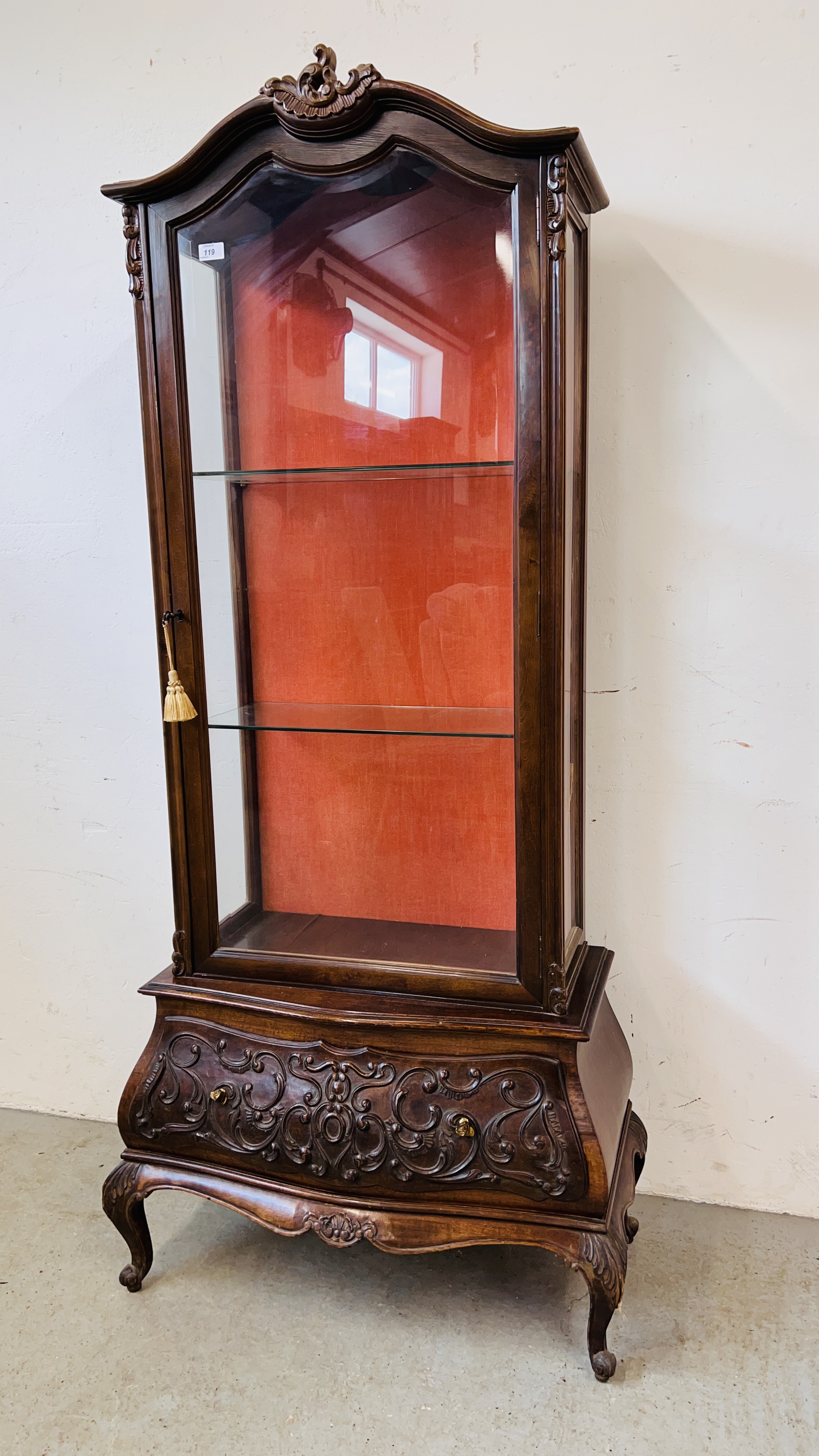 A REPRODUCTION CONTINENTAL STYLE DISPLAY CABINET WITH DRAWER TO BASE - W 83CM. D 41CM. H 183CM.