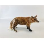 A WINSTANLY MODEL OF A FOX, HEIGHT 16.5CM X LENGTH 30CM.