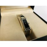 A DESIGNER LADIES WRIST WATCH MARKED "GUCCI" IN ORIGINAL BOX.