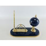 A GEMSTONE GLOBE DESK TIDY