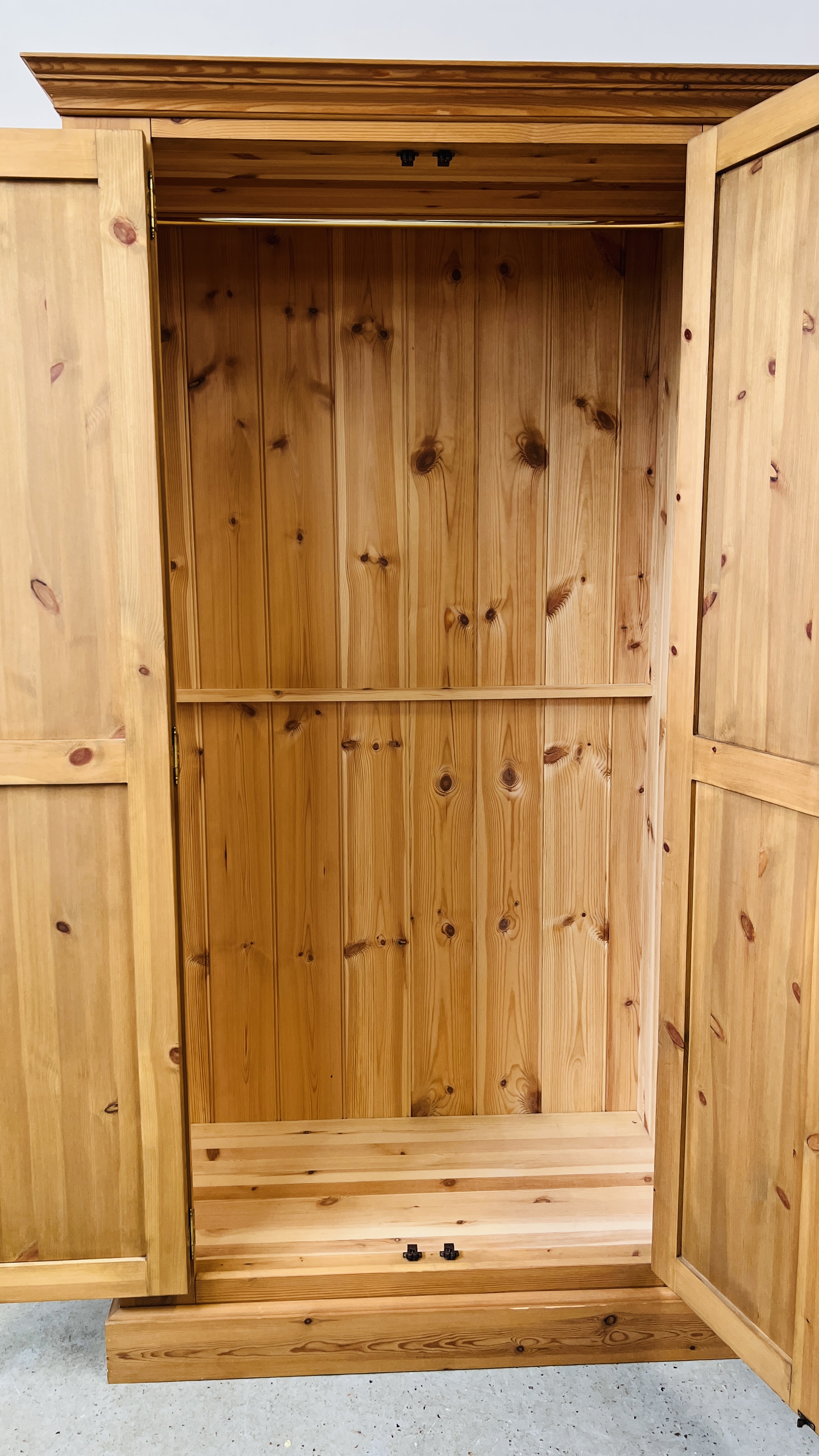 A GOOD QUALITY WAXED PINE TWO DOOR WARDROBE, W 108CM, D 60CM, H 196CM. - Image 9 of 9