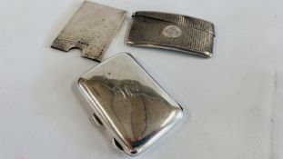 A VINTAGE SILVER CIGARETTE CASE, BIRMINGHAM ASSAY, SILVER MATCH HOLDER AND ONE OTHER.