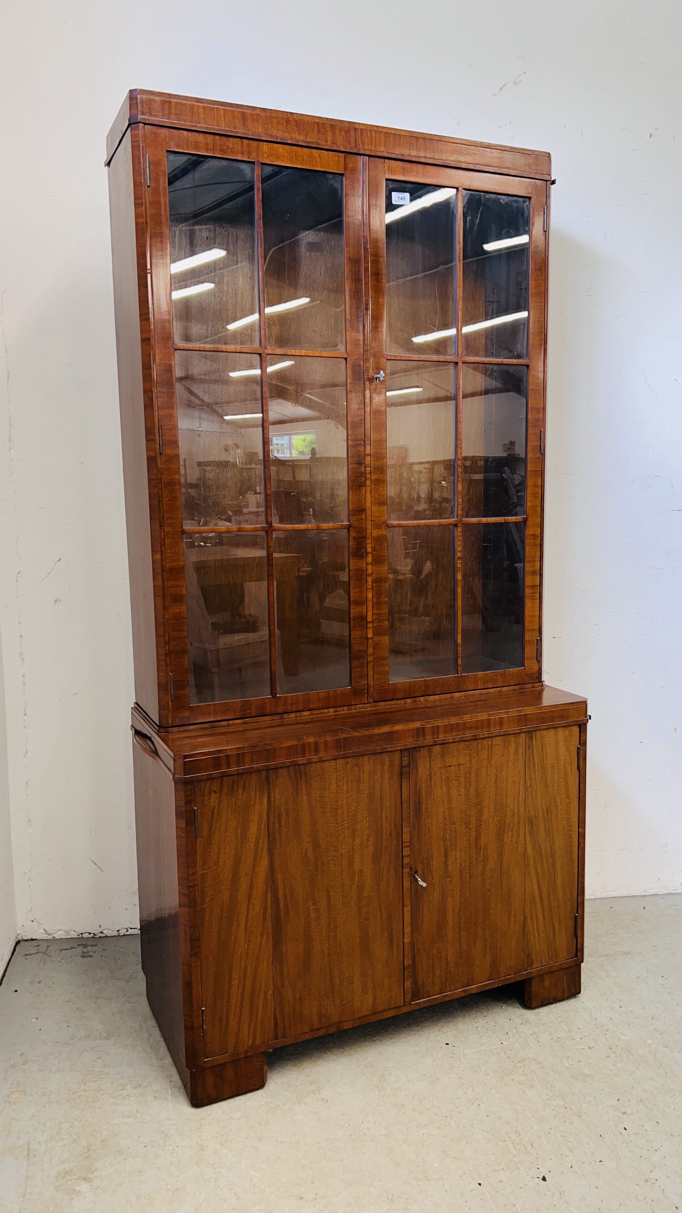 A 1930'S TWO DOOR MAHOGANY BOOKCASE ON CUPBOARD BASE - W 92CM. D 40CM. H 184CM. - Image 2 of 15